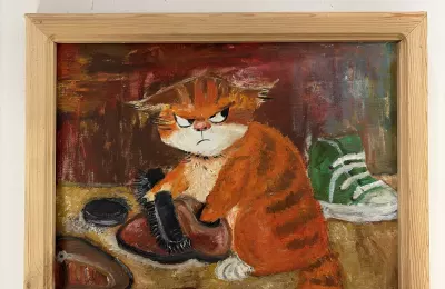 Рыжий кот с обувью